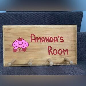 Amanda’s Room wooden clothing plaque with pegs